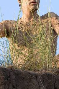 Young woman with closed eyes experiencing harmony with nature